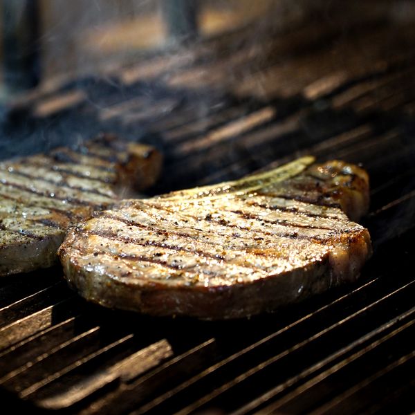 Burgers cooking on a barbecue grill