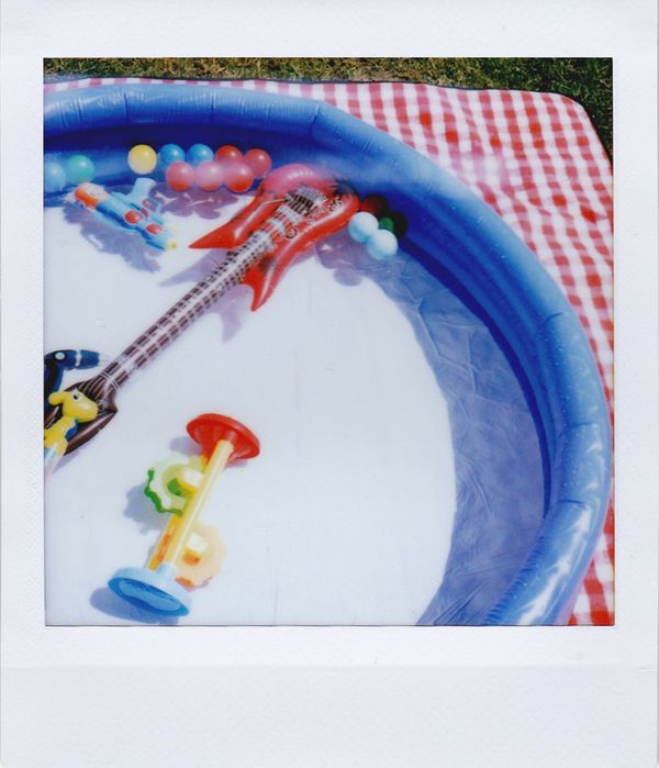 A colourful inflatable pool seen from above